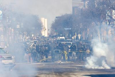 Protesters clash with law enforcement after federal agents shot and killed Alex Pretti on Jan. 24, 2026, in Minneapolis.