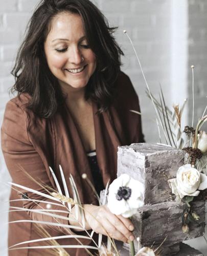 Cake designer with cake