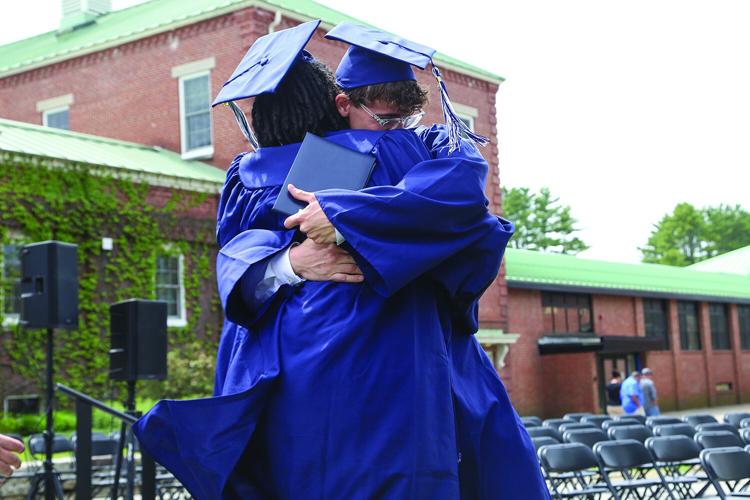05-23-26 Fryeburg Graduation recessional hug 1