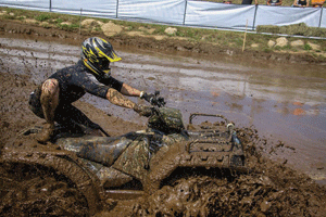 Romik Developers helps secure the mud for the ATV Festival