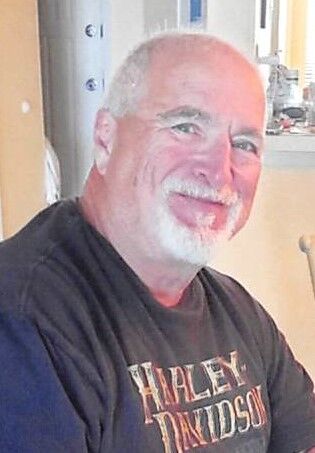 Obituary Louis E. Bacon