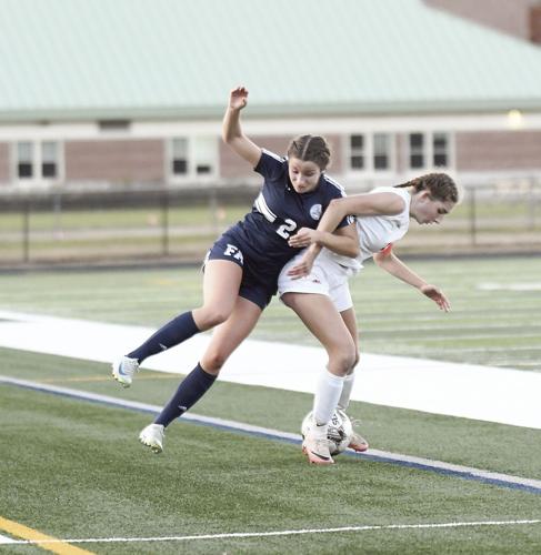 FA Girls Soccer - Eden True and defender tied up
