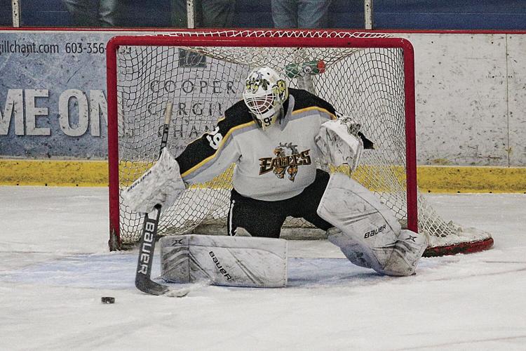 12-07-22 KHS Hockey moore deflect