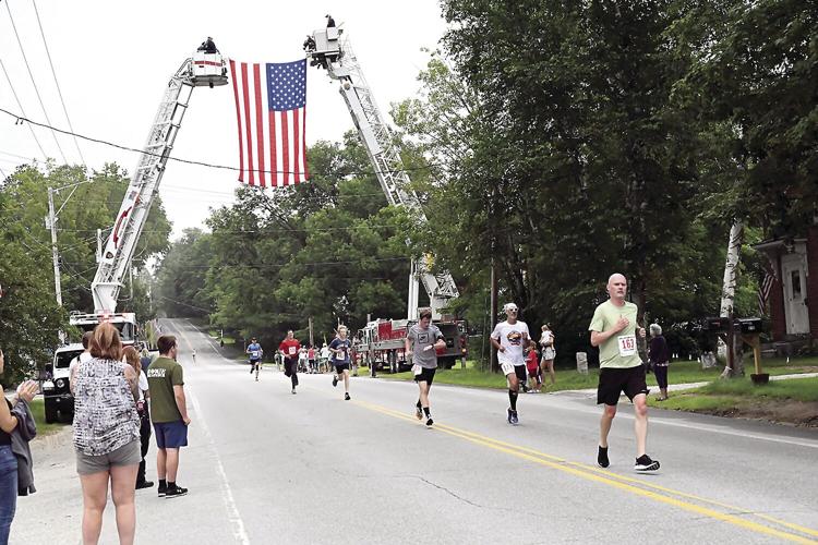 Lovell Old Home Days 5 - running under the flag