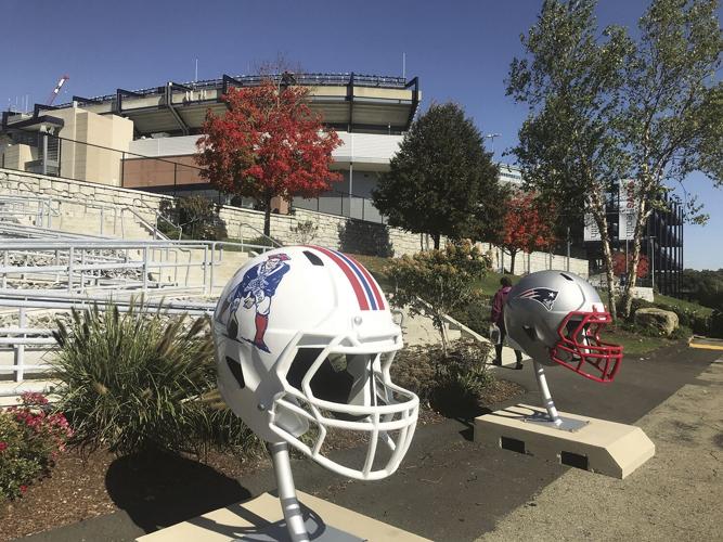 18 pats walk to stadium statues