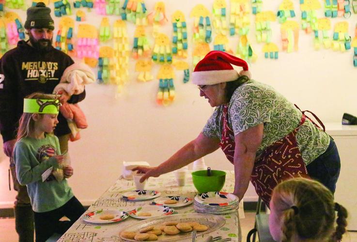 12-19-25 Conway Rec Letters handing cocoa