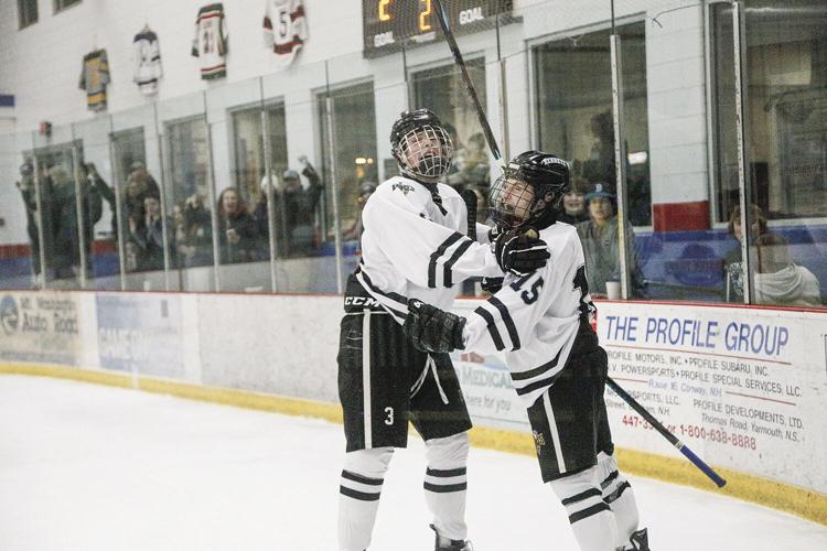 12-18-24 KHS Hockey lopashanski goal 2 hugs 1