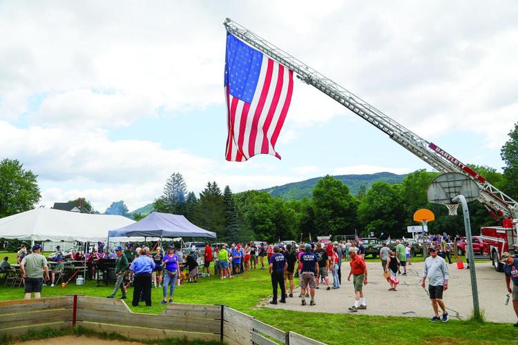 07-04-25 Fourth Parade bartlett flag over festivities