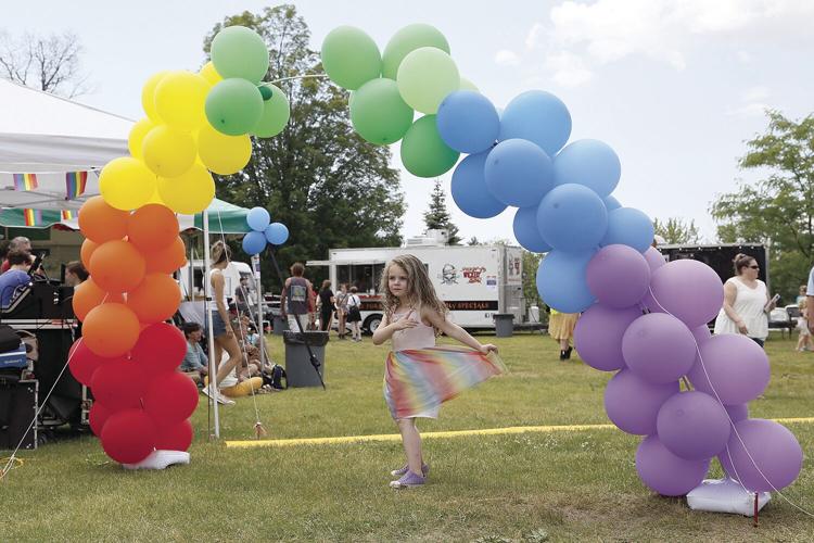 06-25-22 Pride Fest rainbow kid under arch