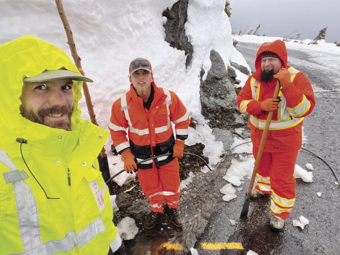 trio smile while clearing