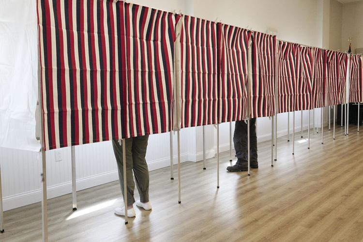 06-11-24 Fryeburg Voting legs in booths
