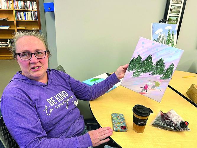 Nordic Tracks - preparing for the first ski - Nancy Ekse with painting