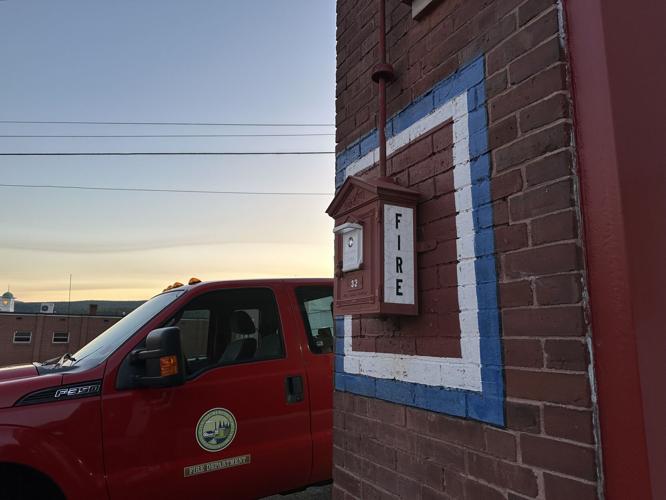 A fire box is mounted outside of the Berlin Fire Department