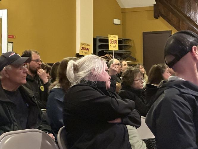 Berlin residents fill seats in city hall auditorium Monday night, March 16