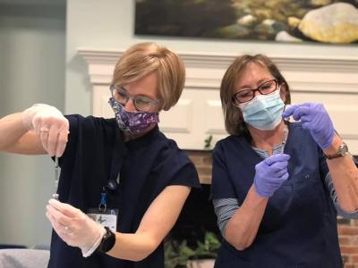 vnhch nurses with vax.jpg