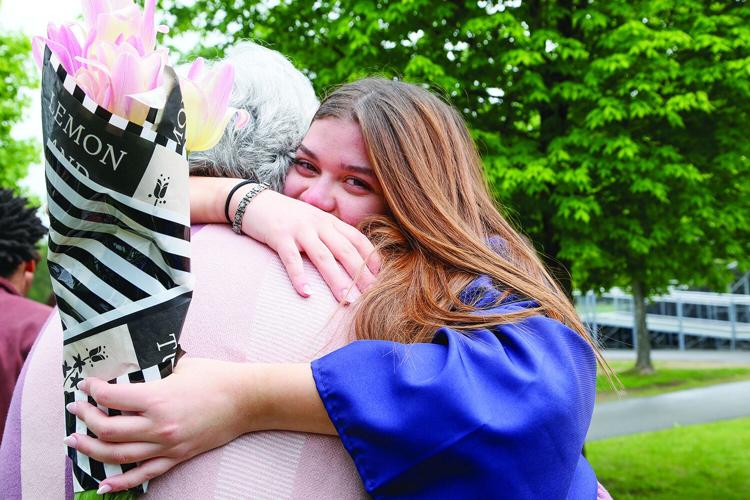 05-24-25 FA Graduation hug medium