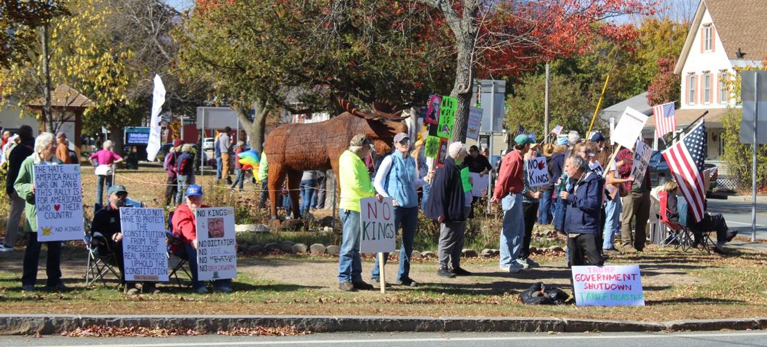 'No Kings' protest and wooden moose sculpture at Gorham town common