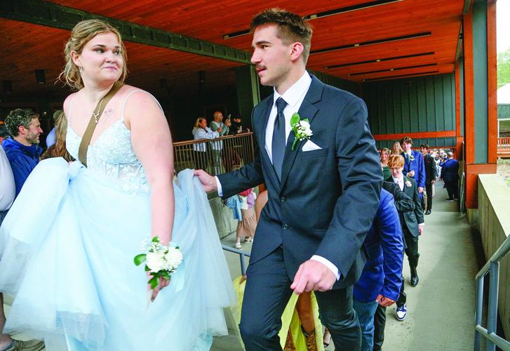 05-17-25 KHS Prom holding up dress tighter