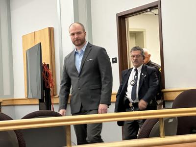 Craig Keville enters the courtroom o