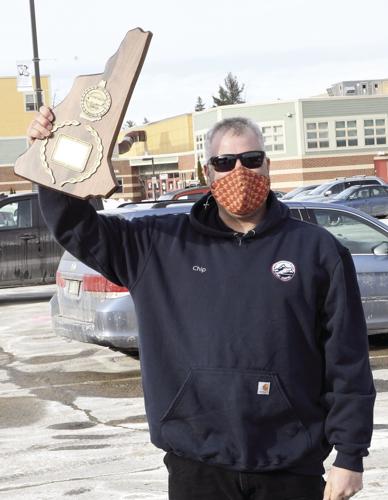 Ski jump naming - Chip Henry with trophy