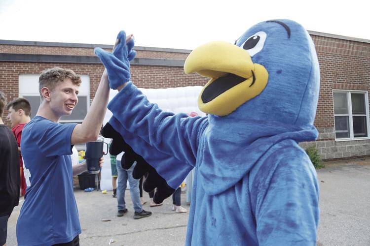 06-13-24 Falcon Fire high five falcon