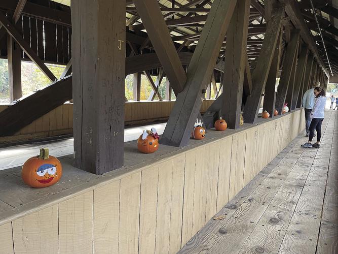 Wheel Family Fun - pumpkin people - pumpkins on the covered bridge