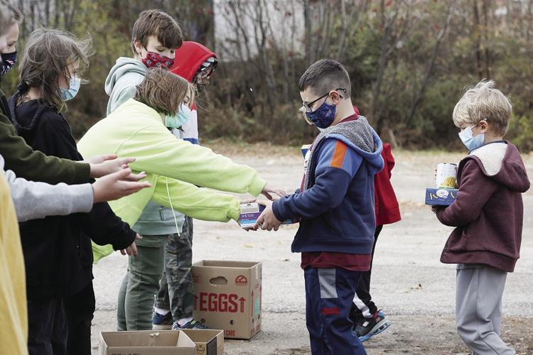 11-19-21 Food March handing over outside