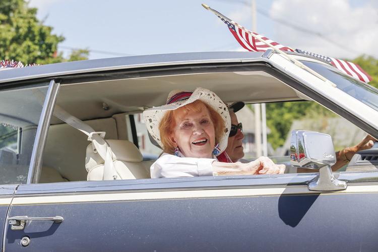 07-04-22 4th Bartlett Parade smiling out window cowgirl