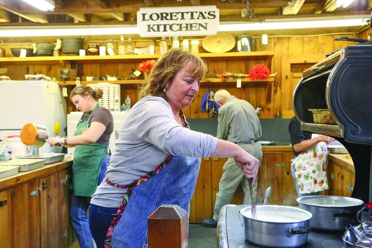 10-04-26 Fryeburg Fair lorettas kitchen stirring