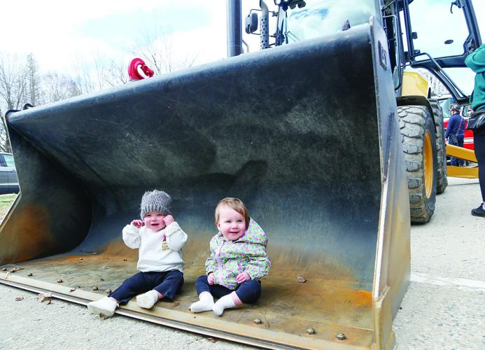04-16-25 Touch-A-Truck babies in bucket