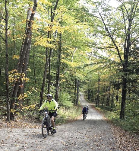 Wheel Fun - Riders climb leaf covered gravel roads in Tamworth and Sandwich