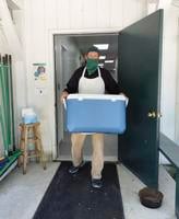 Camp Huckins helps provide meals to community