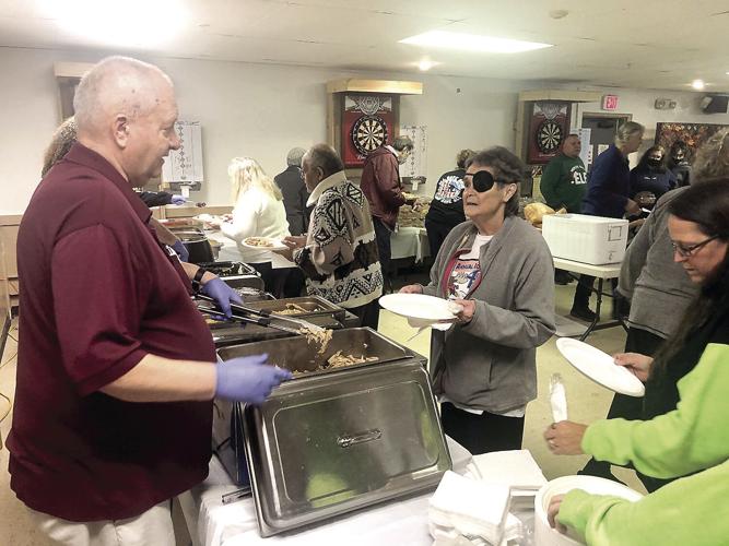 VV - Roy Larson serving Thanksgiving