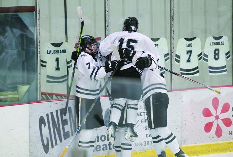 02-28-26 KHS Hockey zipf goal hugs 2
