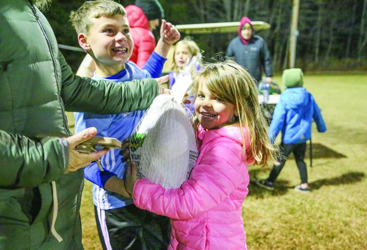 11-24-25 Conway Rec Turkey Trot siblings with turkey