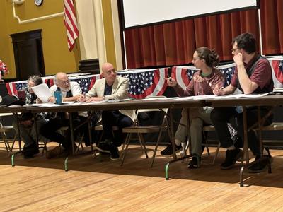 ZBA board members review and discuss a special exception application by DWP Realty LLC