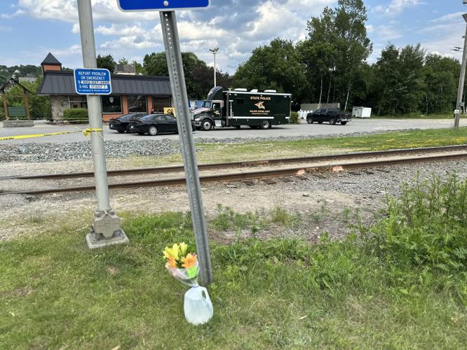 Flowers near the scene of the murder-suicide inside La Casita restaurant
