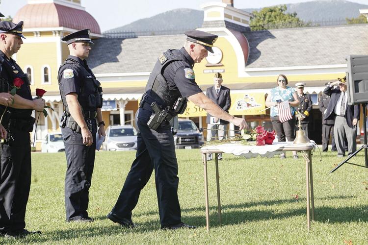 09-11-24 9-11 Remembrance flower pd placing mattei