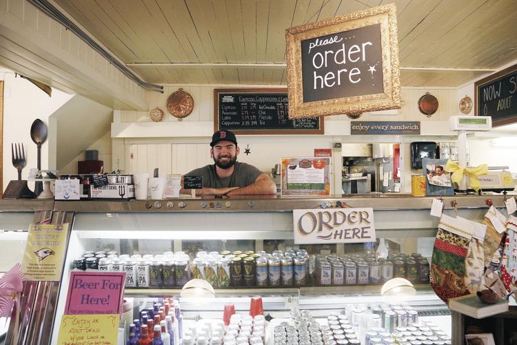 04-15-21 J-Town front cooler with worker