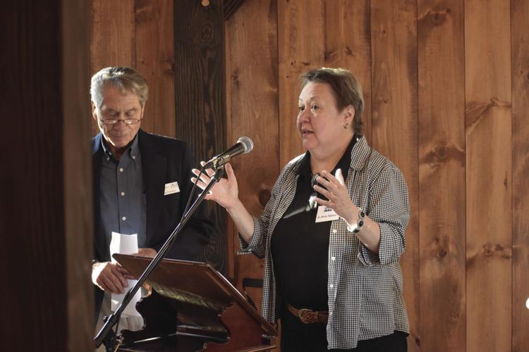 Jo Anne Rainville accepts award