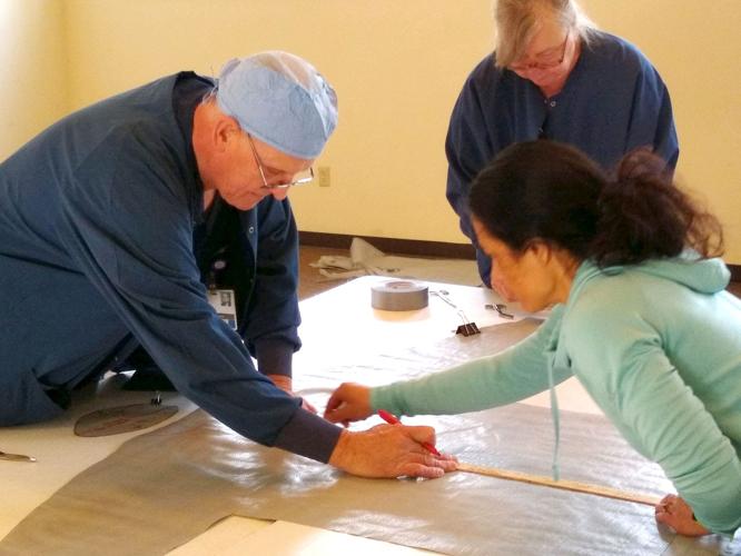 Memorial surgical staff making gowns