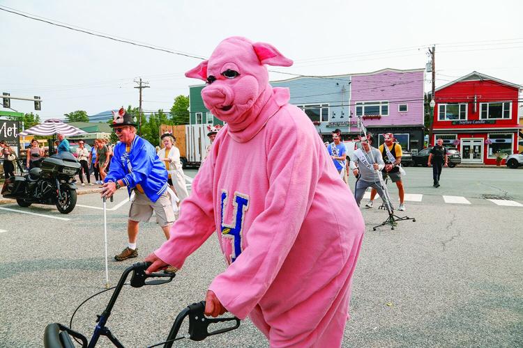 09-06-25 Mud Bowl Parade hog mascot walker