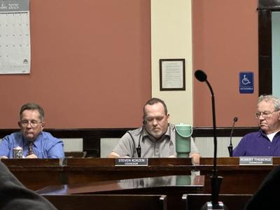 City councilors Paul Grenier, Steven Korzen, Robert Theberge