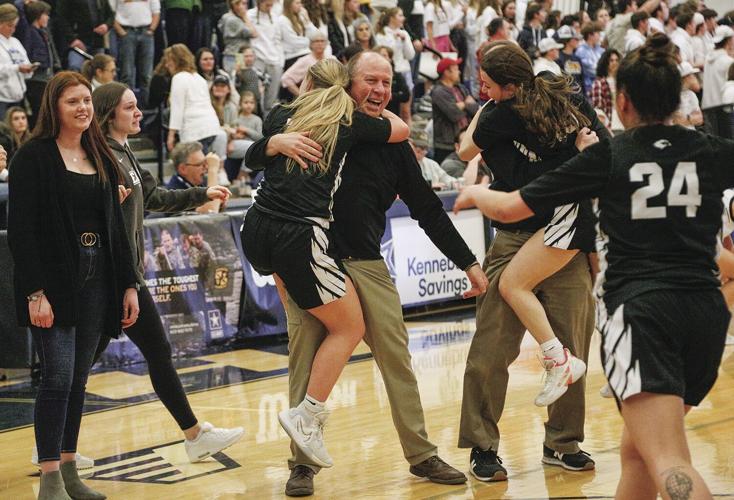 03-12-23 KHS WBB hug after win coach