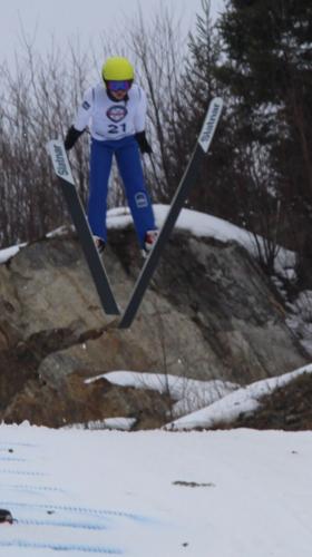 Anders Holland of Fort Sayre soars through the air