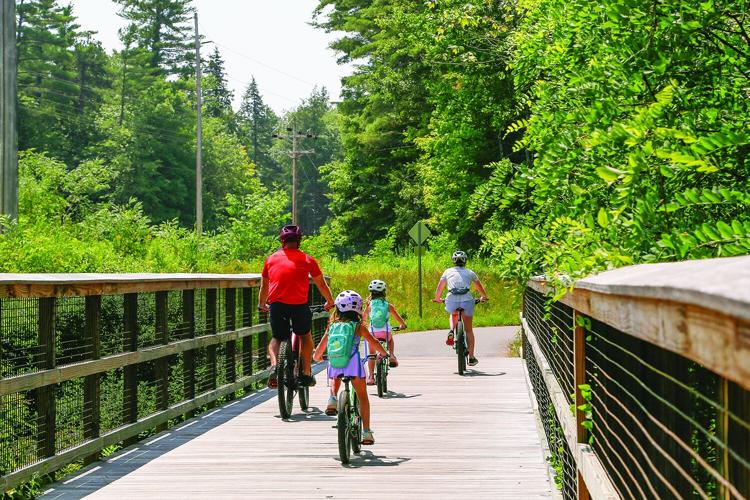 07-26-25 Bike for Books rec path family behind