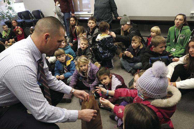 12-21-22 Gingerbread Hunt pd collecting evidence