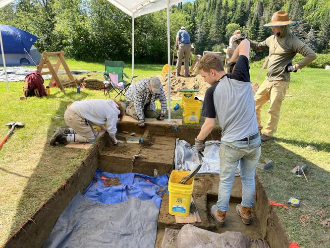 People at an Errol archaeological site