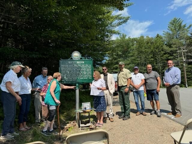 Federal, state and local officials gathered at the state historic "Betty Brook" marker