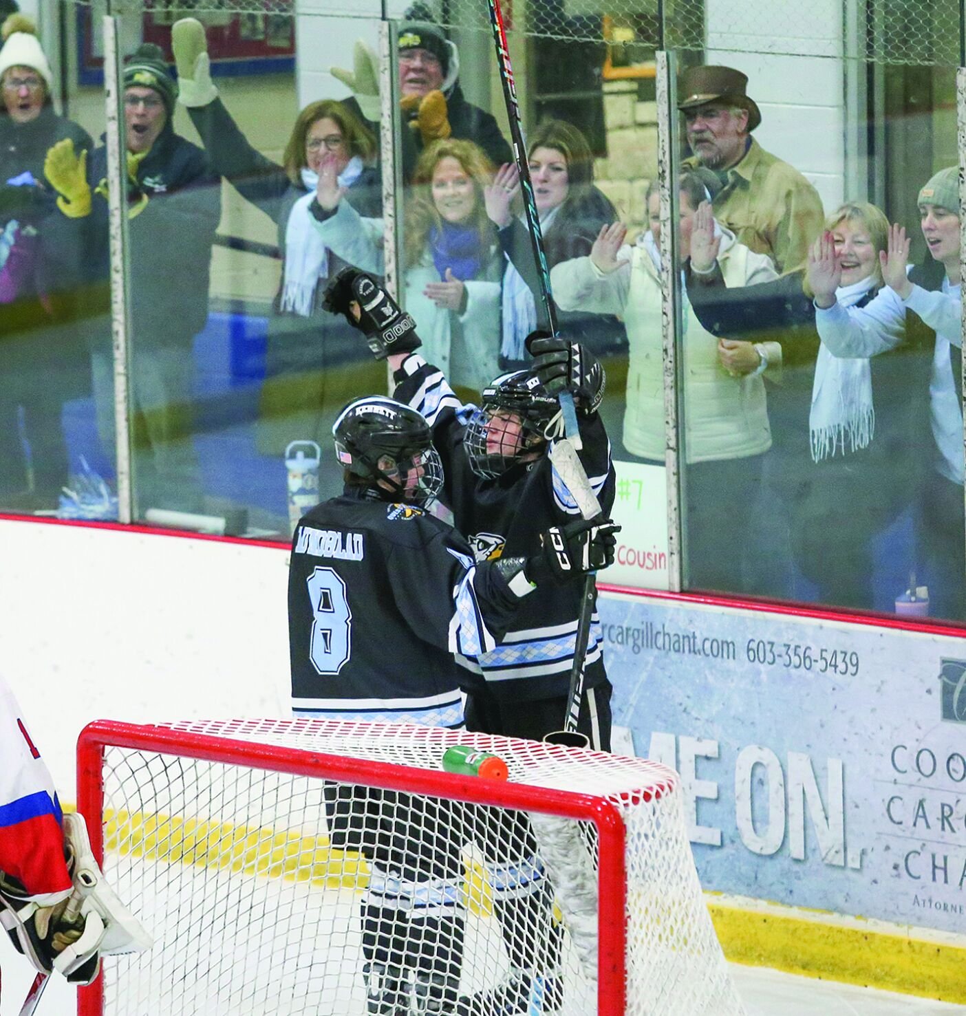 02-14-26 KHS Hockey Fights Cancer huot goal hugs 1